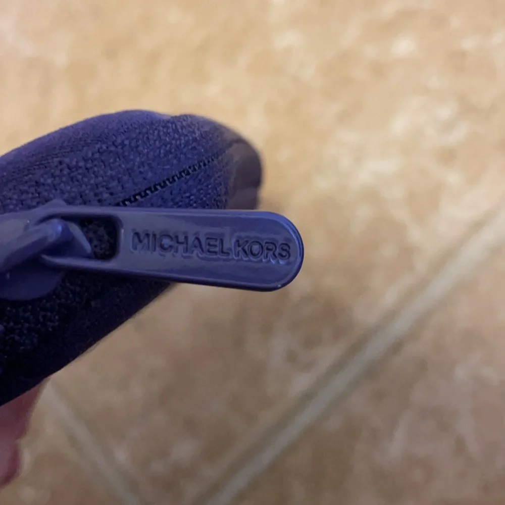 Michael Kors Wrist Camera Case in purple